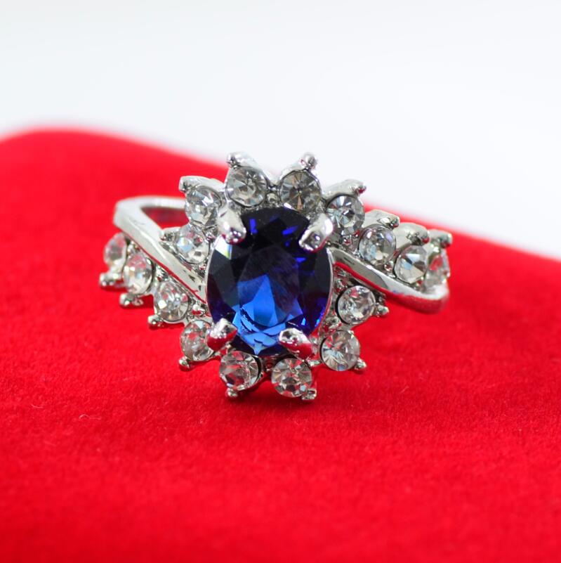 Oval Ruby & Diamond Zircon Engagement Ring